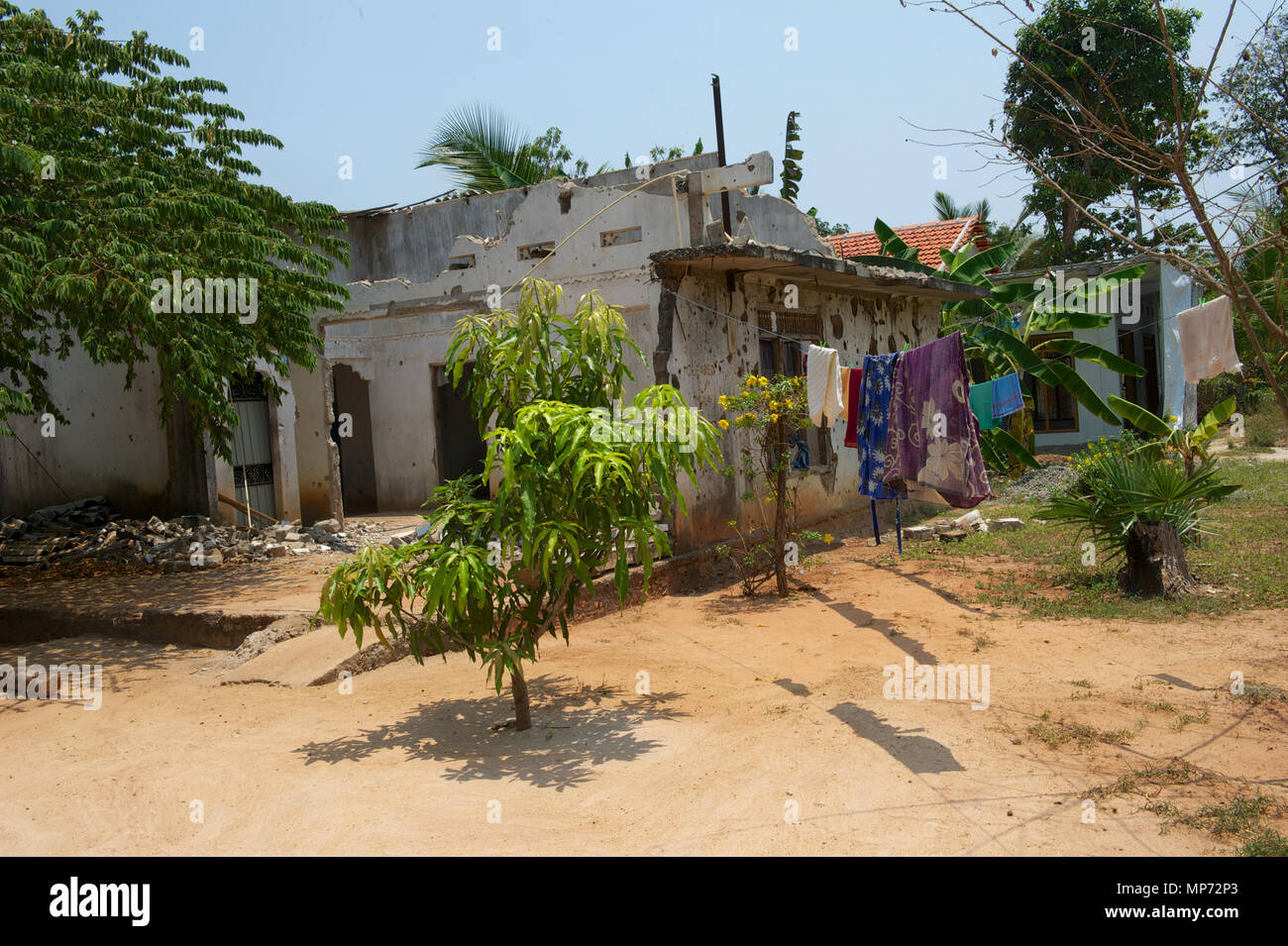 22 March 2018, Sri Lanka, Mullaitivu: A house with bullet holes from the Sri Lankan Civil War (1983-2009). Sri Lanka was shattered by a civil war between the ethnic majority of the population, the Singhalese people, and the Tamil minority. Tamil separatists fought for an independent state in the north of the island. In the end, the Liberation Tigers were beaten by the Sri Lankian army. Photo: Ursula Düren/dpa Stock Photo