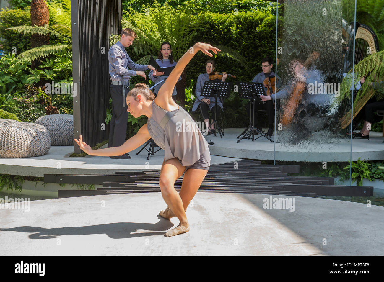 London, UK. 21st May 2018. Constella Opera Ballet perform a unique piece within the VTB Capital Spirit of Cornwall Garden, designed by Stuart Charles Towner and inspired by the work of sculptor Barbara Hepworth with music by composer Leo Geyer - Press day at The RHS Chelsea Flower Show at the Royal Hospital, Chelsea. Credit: Guy Bell/Alamy Live News Stock Photo