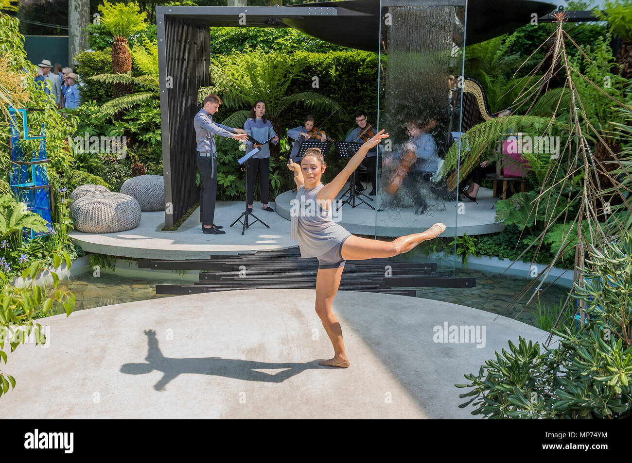 London, UK. 21st May 2018. Constella Opera Ballet perform a unique piece within the VTB Capital Spirit of Cornwall Garden, designed by Stuart Charles Towner and inspired by the work of sculptor Barbara Hepworth with music by composer Leo Geyer - Press day at The RHS Chelsea Flower Show at the Royal Hospital, Chelsea. Credit: Guy Bell/Alamy Live News Stock Photo