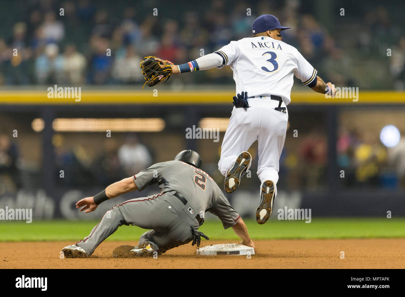 Milwaukee, WI, USA. 21st May, 2018. Arizona Diamondbacks catcher Jeff Mathis #2 attempts to break up a double play during the Major League Baseball game between the Milwaukee Brewers and the Arizona Diamondbacks at Miller Park in Milwaukee, WI. John Fisher/CSM/Alamy Live News Stock Photo