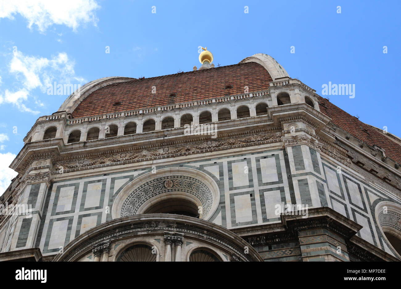 big dome of the Cathedral of Florence in Italy with gold sphere on top ...