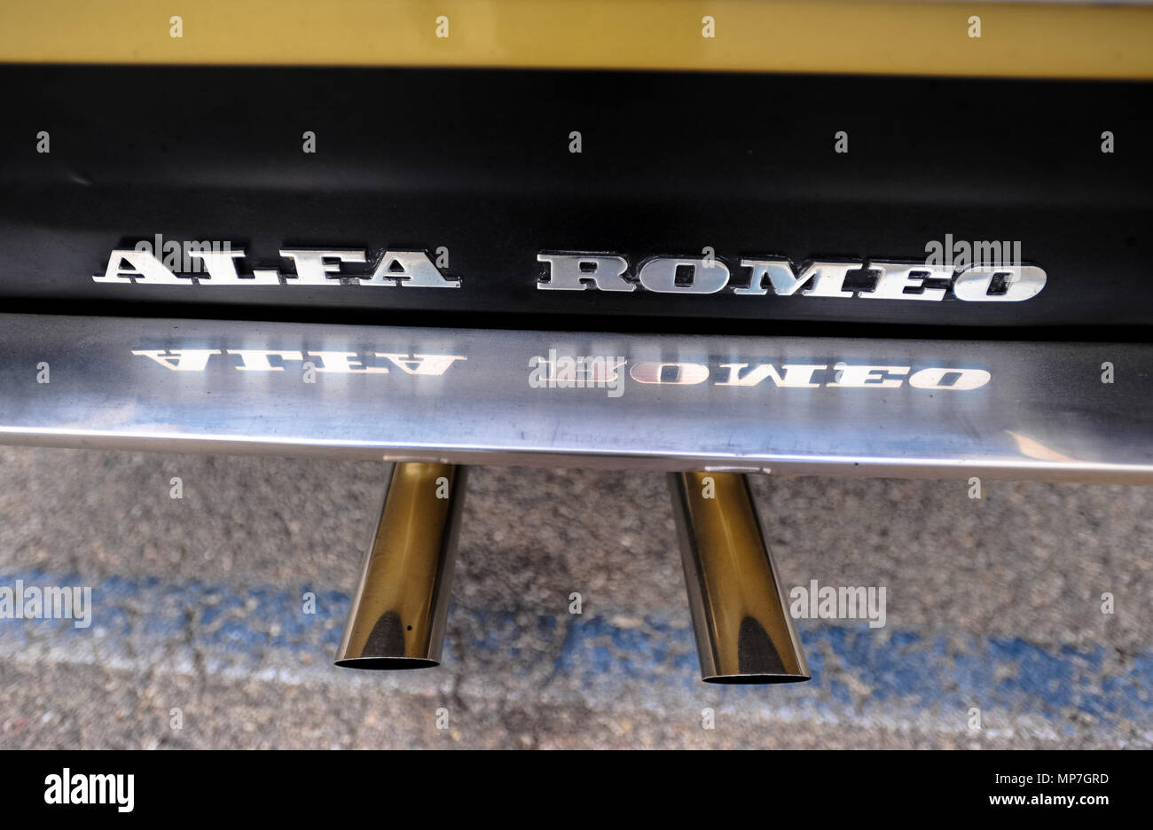 Detail of the exhaust pipe of an Alfa Romeo classic Stock Photo Alamy