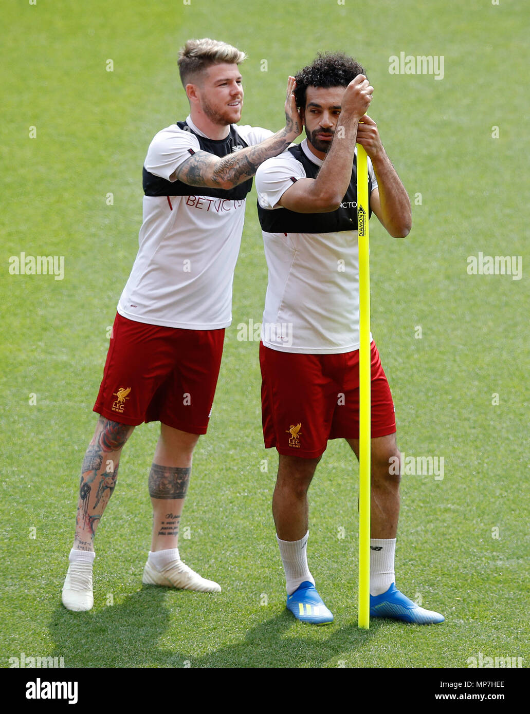 Liverpool S Alberto Moreno Left And Mohamed Salah During The Training Session At Anfield Liverpool Stock Photo Alamy