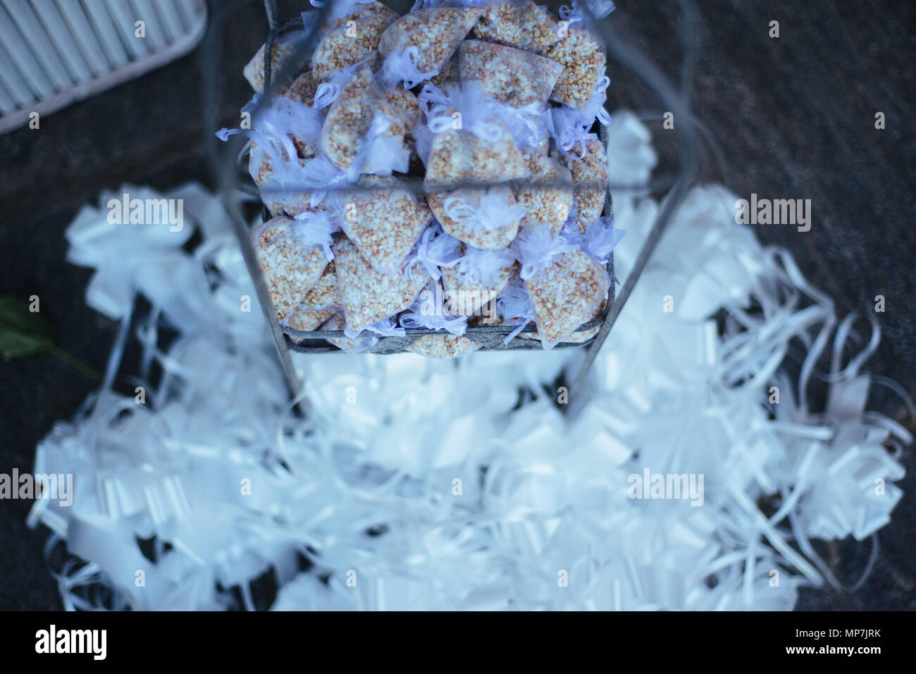 bird cage with rice bags for wedding celebration Stock Photo Alamy