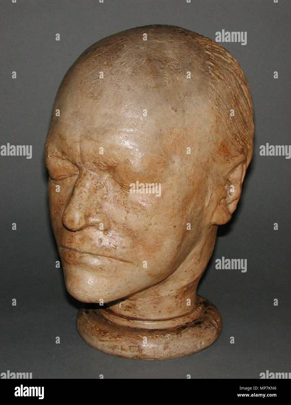 . English: James S De Ville 1776-1846 Head of William Blake - Plaster cast - Sept 1823 Fitzwilliam Museum Title: Head of William Blake (1757-1827) Maker(s) & Production: De Ville, James S., maker, 1776-1846, plaster cast maker, England, London Category: sculpture Name: life mask Date: 1823 The life mask was taken on September 1823 Period(s): early 19th Century; George IV Description: Plaster cast, with shellac? coating. The neck rises from a circular base. In black tin trunk (A) with key (B) not accessioned Technique: casting (process); whole Material(s): plaster; whole shellac; surface; proba Stock Photo