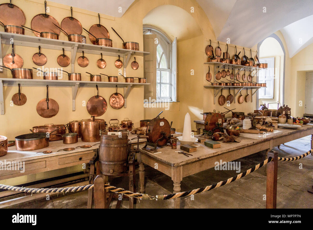 A display of copper pans and vintage kitchen equipment in the Old Kitchen at Inveraray Castle, Argyll & Bute, Scotland, UK Stock Photo