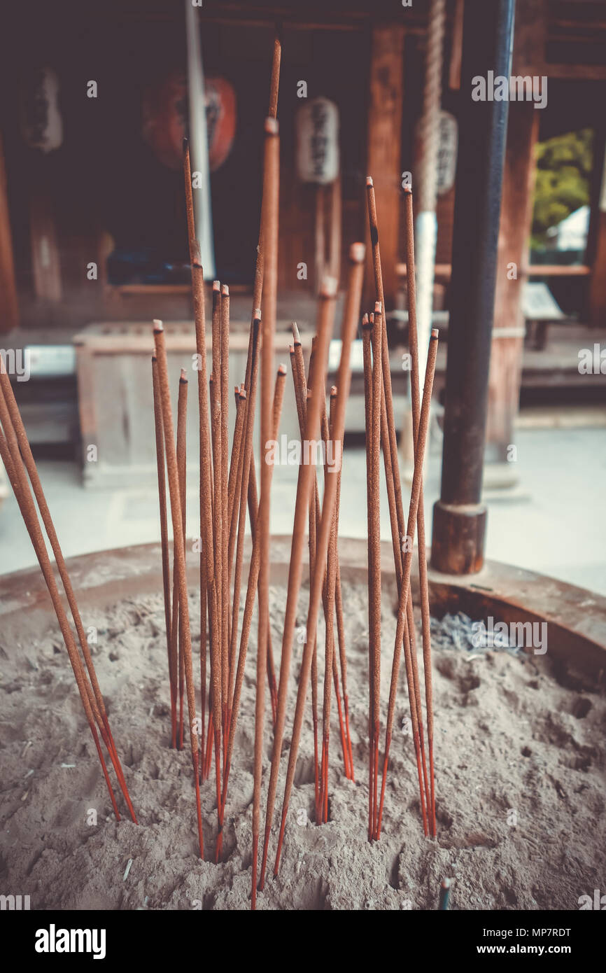 incense sticks in Kinkakuji golden temple, Kyoto, Japan Stock Photo