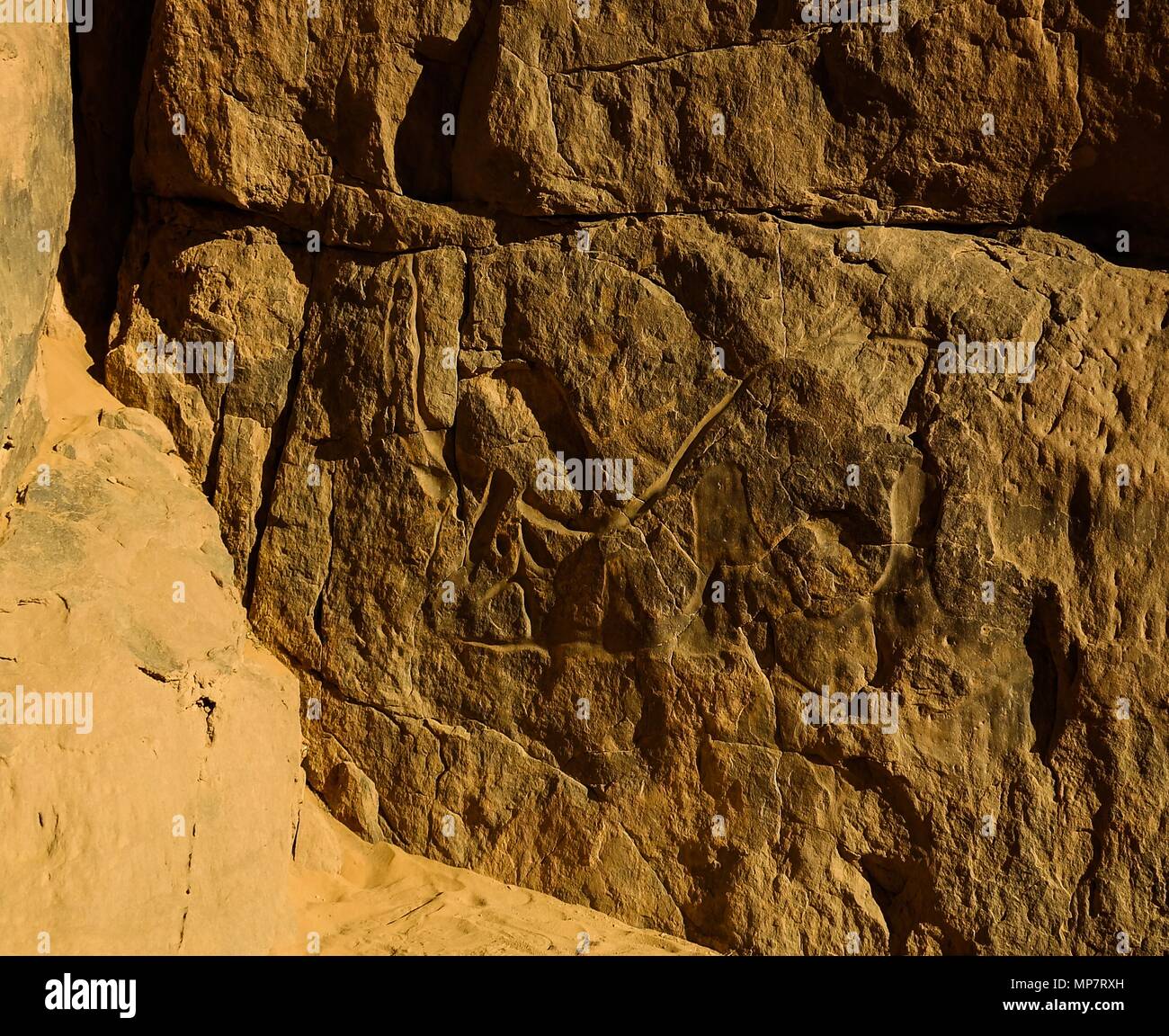 Cave paintings and petroglyphs at Tegharghart in Tassili nAjjer national park, Algeria Stock Photo
