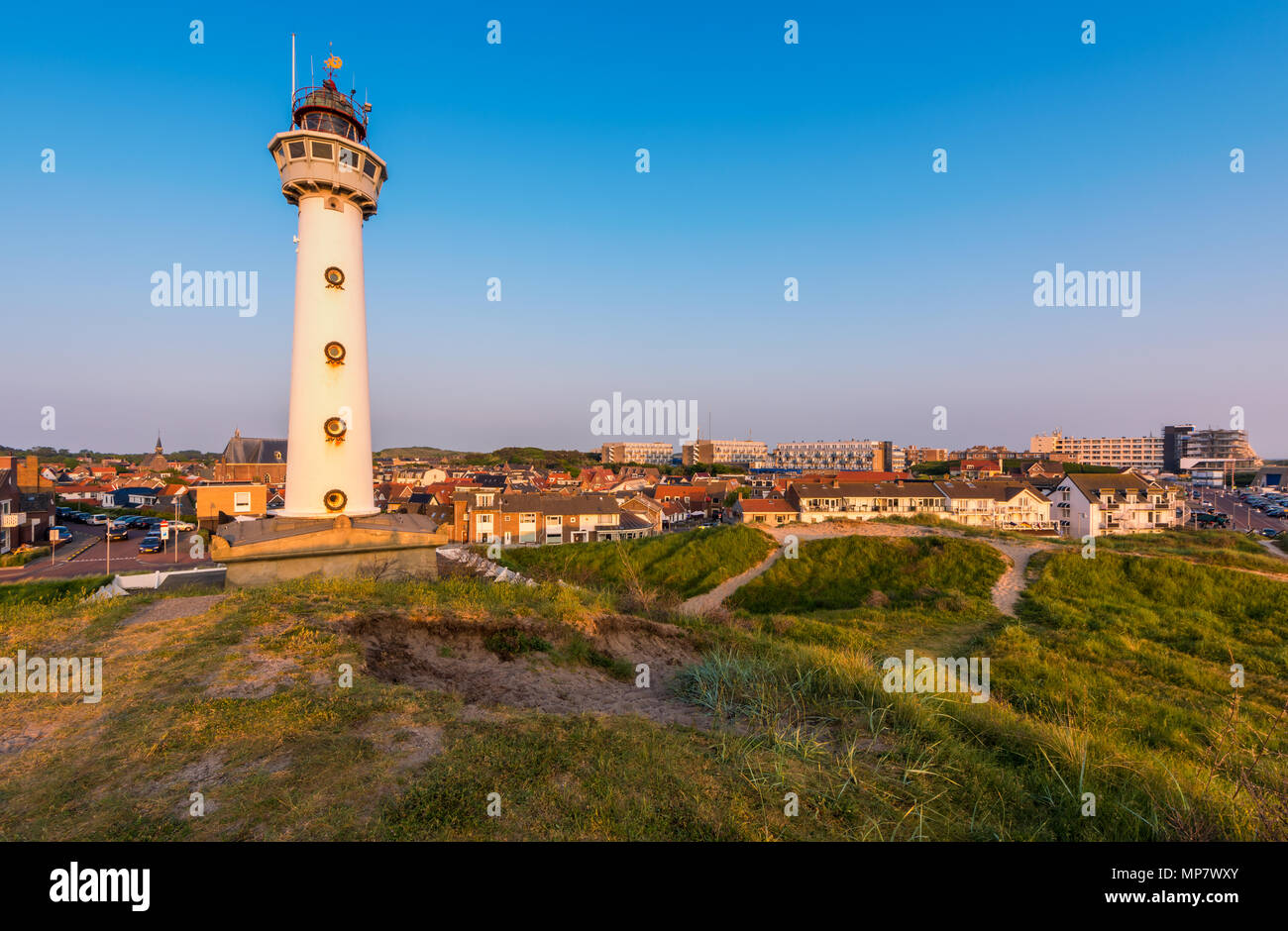Lighthouse and skyline of Egmond aan Zee, a coastal village in North Holland, The Netherlands Stock Photo
