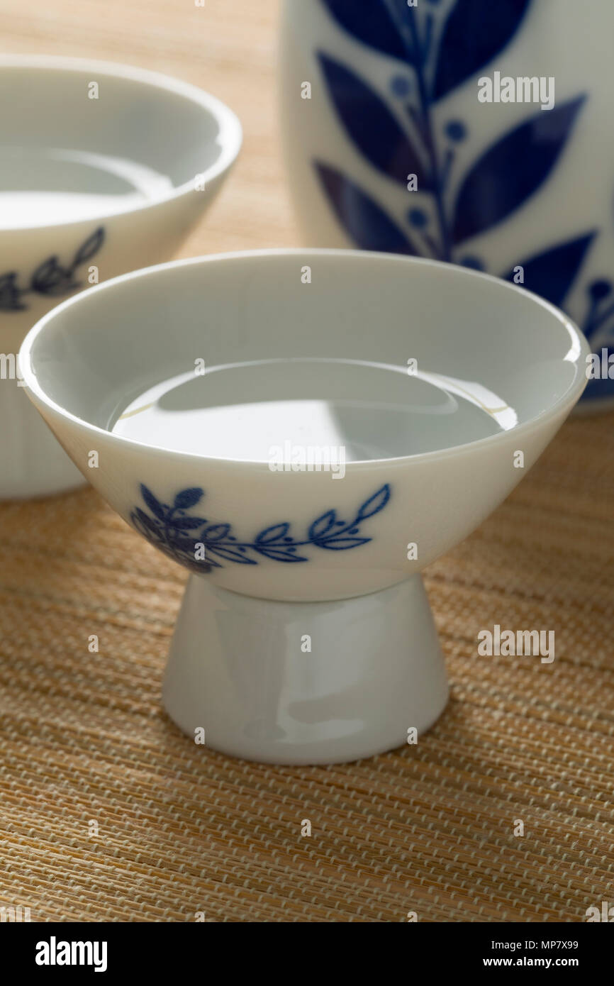 Traditional Japanese cups with sake close up Stock Photo