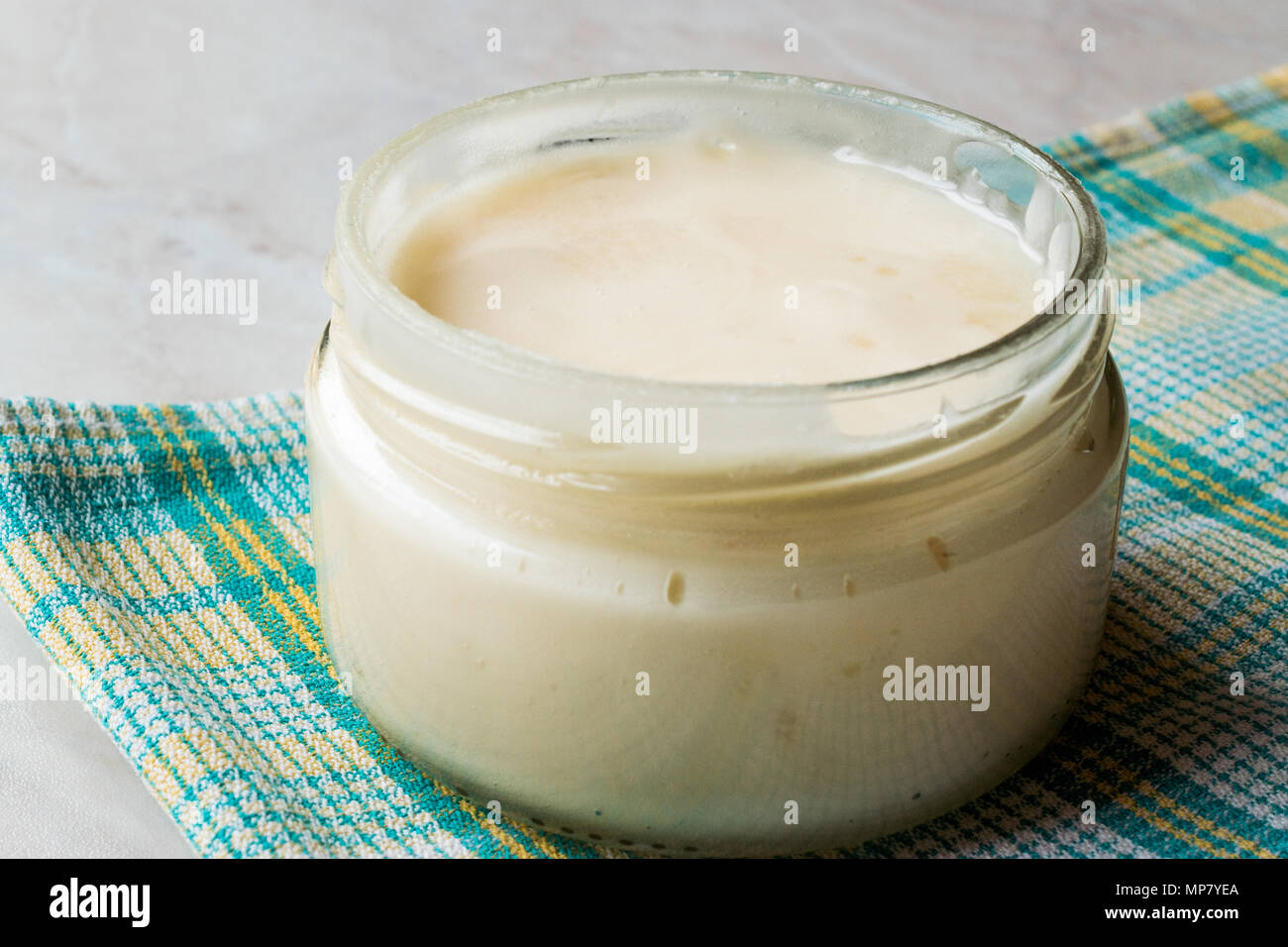 Mastic Gum Paste Pudding Custard in Jar. Dessert Concept. Stock Photo
