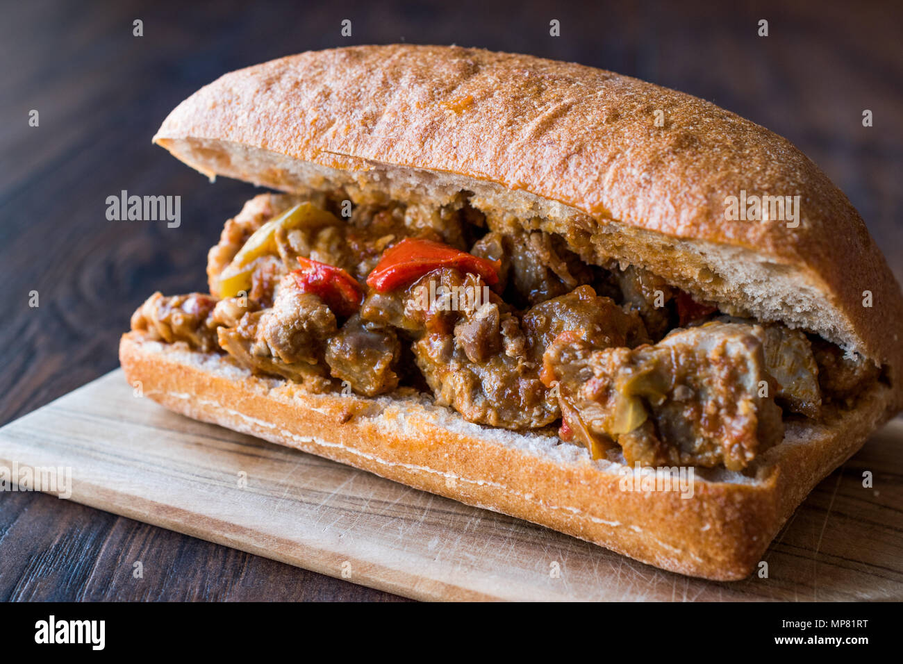 Saute Turkey Meat Sandwich with Ciabatta Bread. FastFood Stock Photo