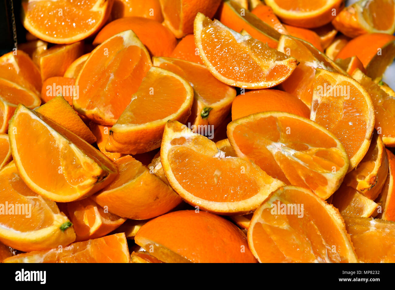 Naranjas cortadas a gajos. Stock Photo