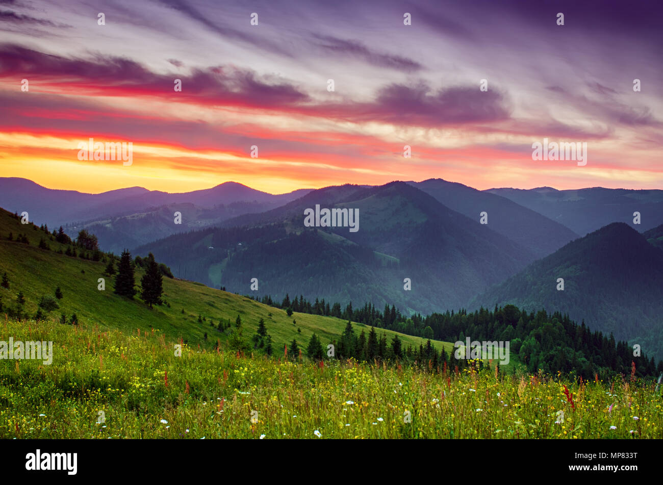 Colorful mountain sunset Stock Photo - Alamy