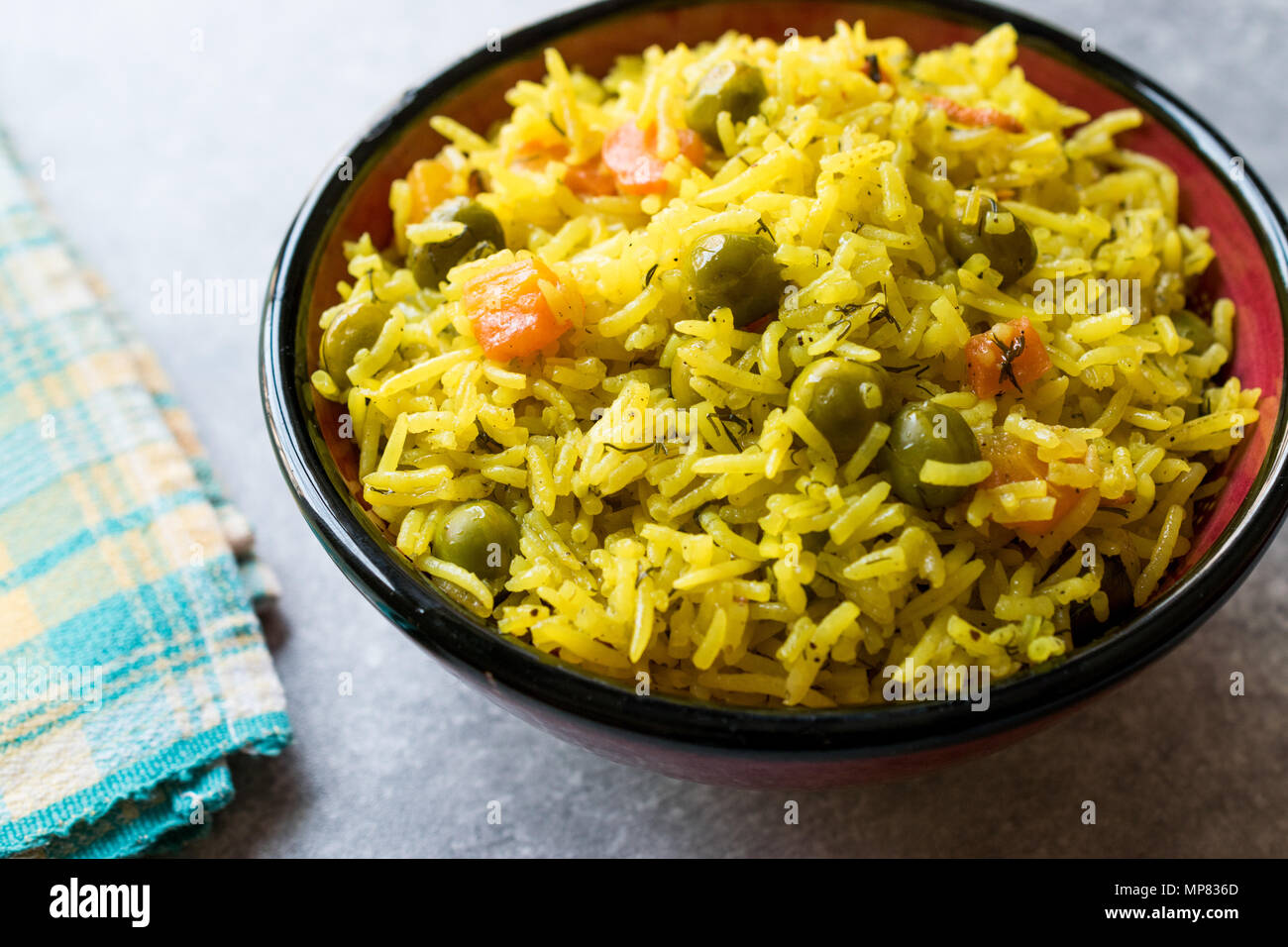 Yellow Saffron Basmati Rice with Turmeric and Vegetables Pilav or Pilaf in Bowl. Asian Food