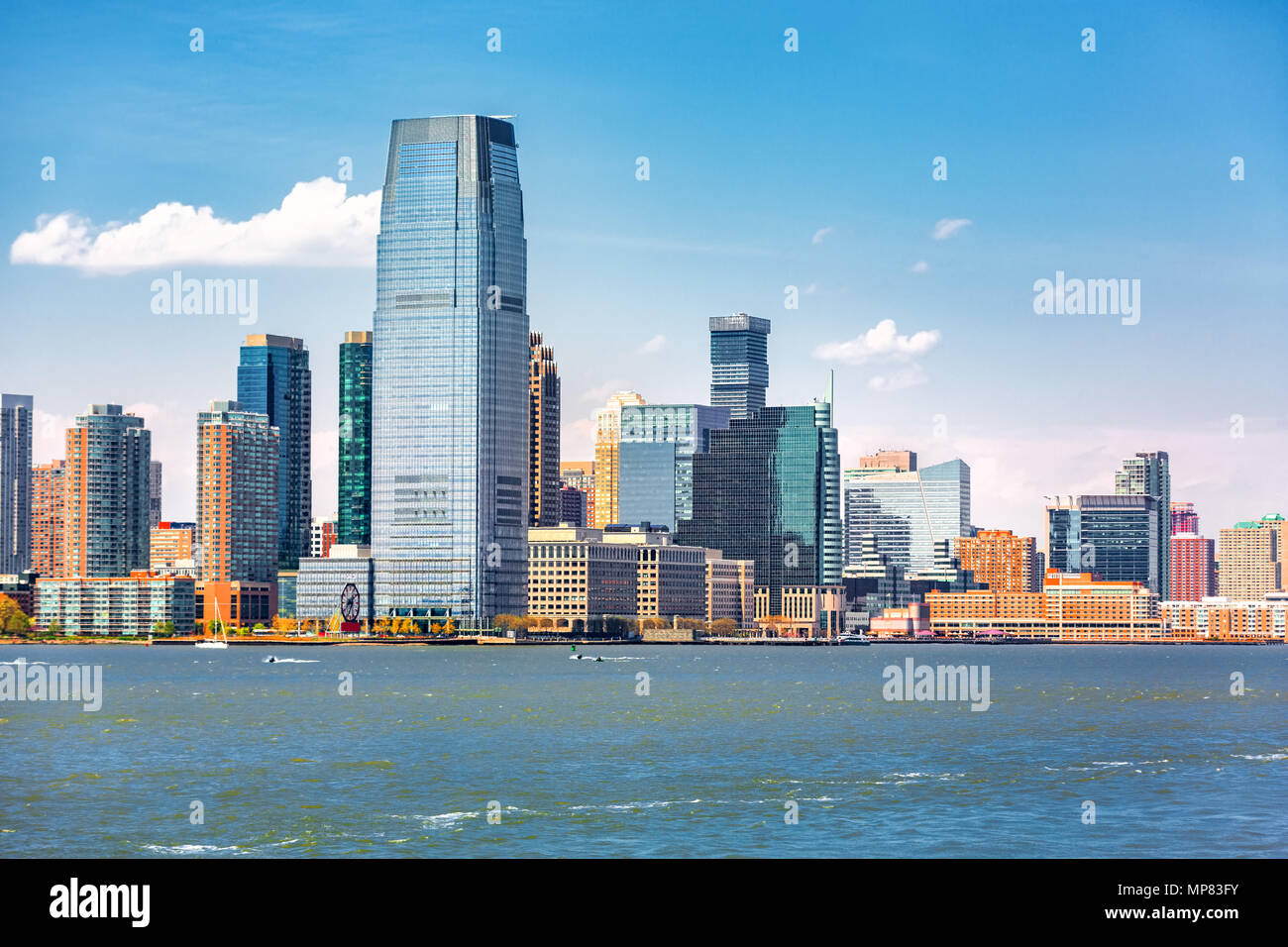 Jersey City skyline viewed from a boat sailing the Upper Bay Stock Photo