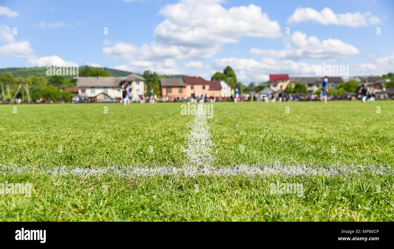 Football field with focus on the sideline, background with copy space for text, banner 16x9 format Stock Photo