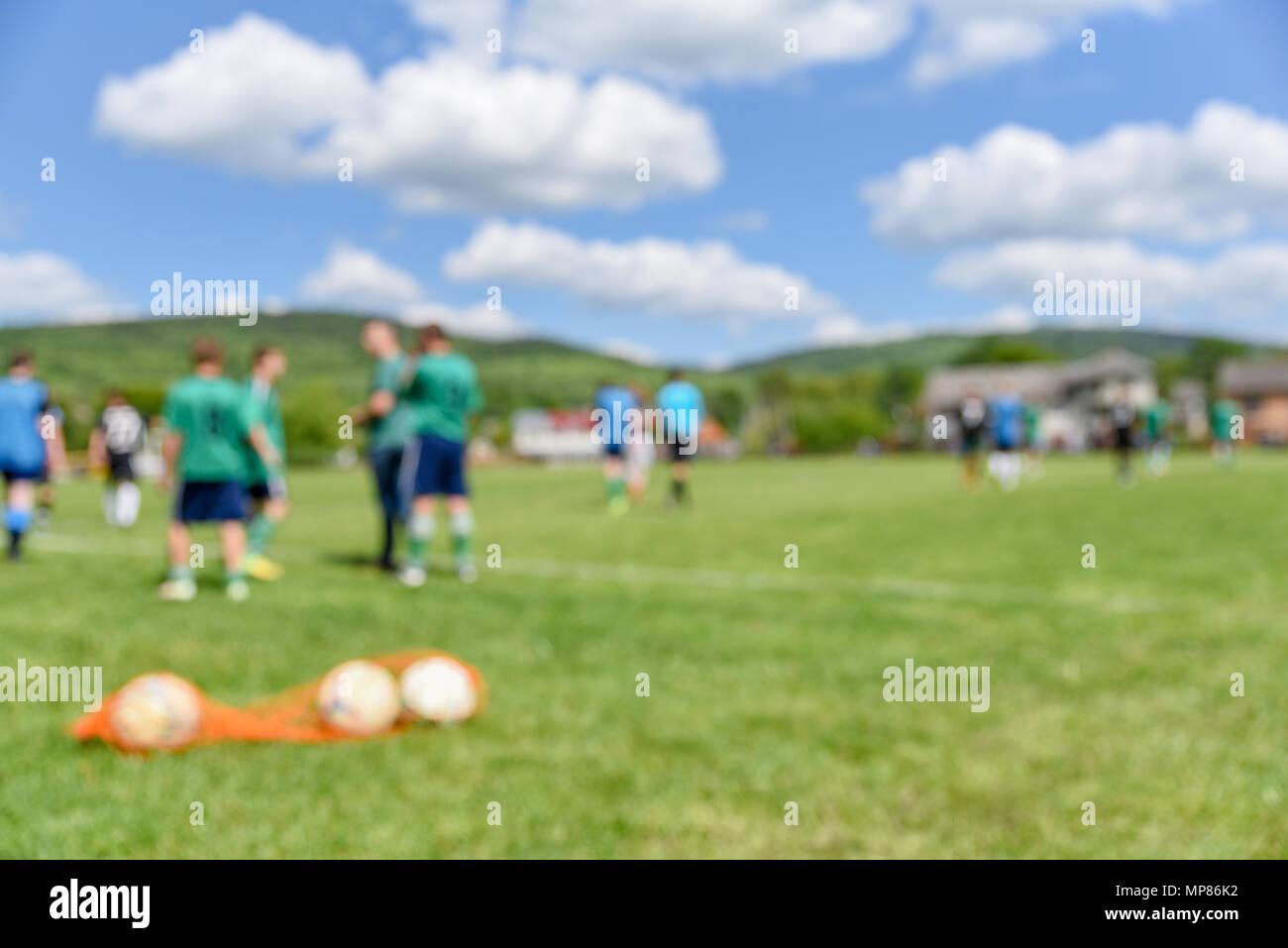 Abstract blur background, football players and soccer balls on the football Stock Photo