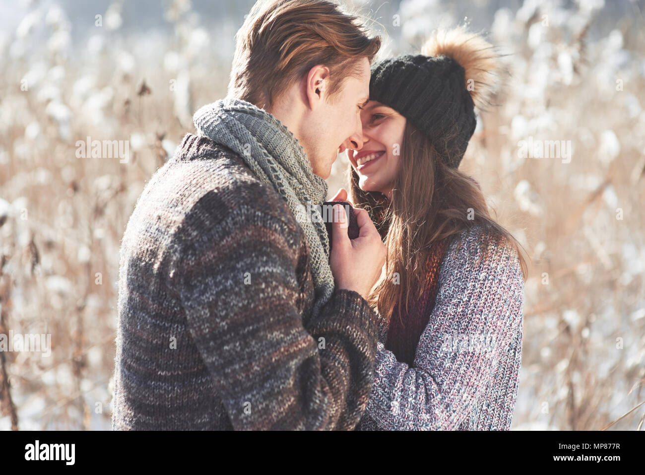 Christmas Happy Couple In Love Embrace In Snowy Winter Cold Forest Copy Space New Year Party