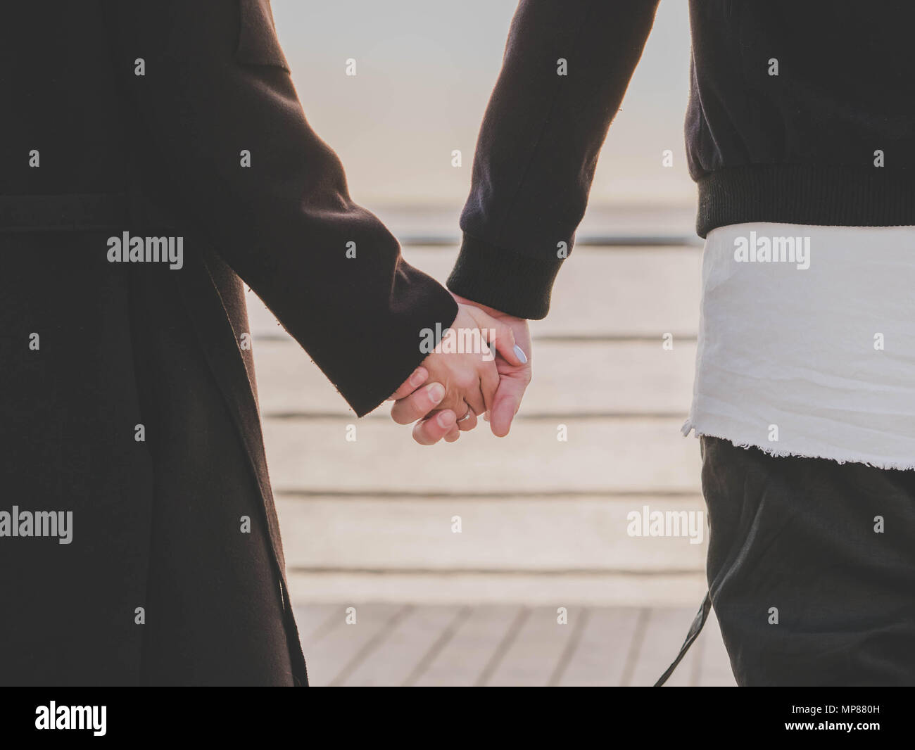 Two hands touching silhouette hi-res stock photography and images - Alamy