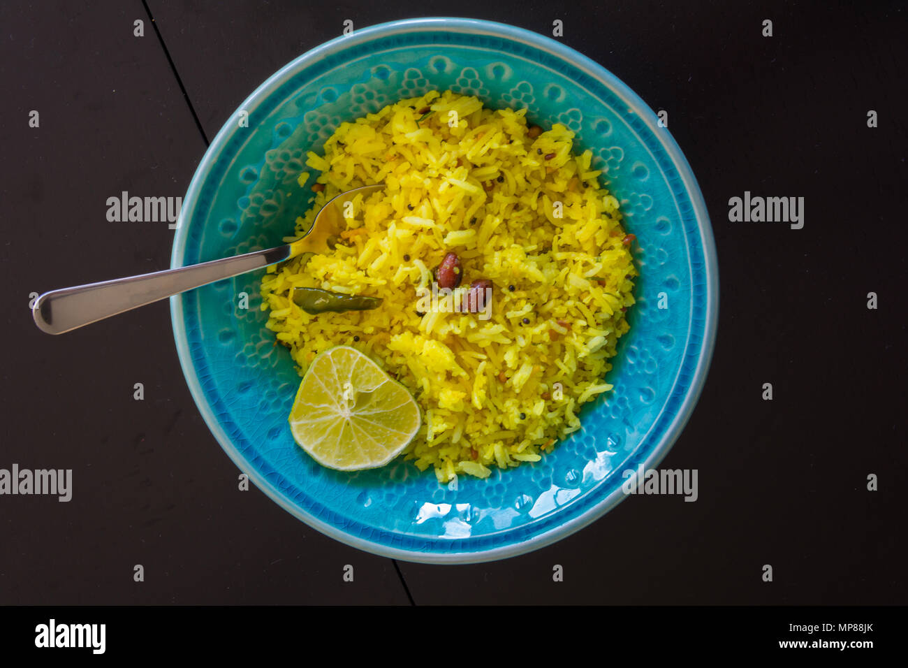 Lemon rice in colorful ceramic bowl Stock Photo