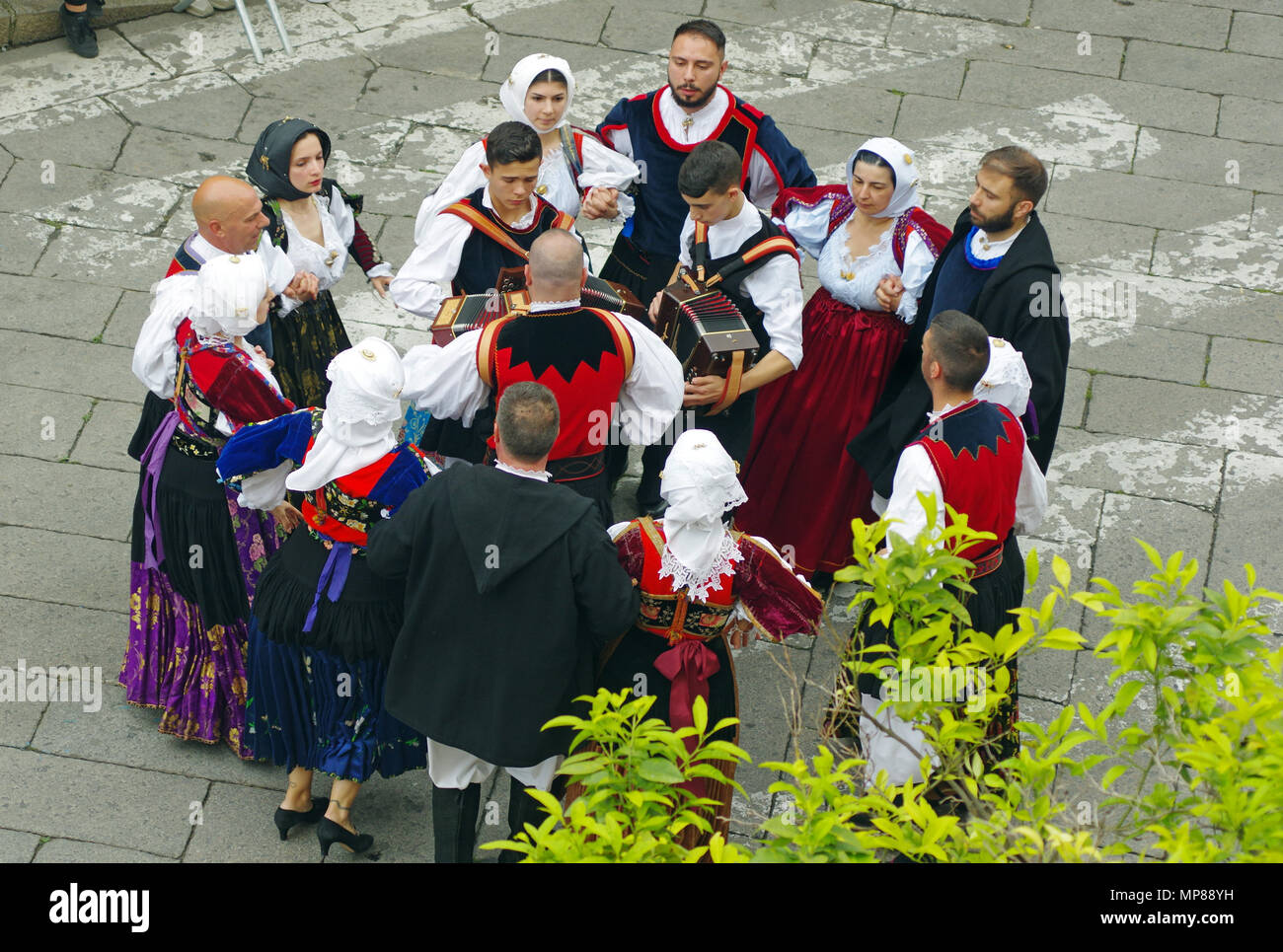 Sardinia folk festival, a traditional folk dance group perform on stage in  the Cavalcata festival in Sassari, Sardinia Stock Photo - Alamy, image size:1300x965