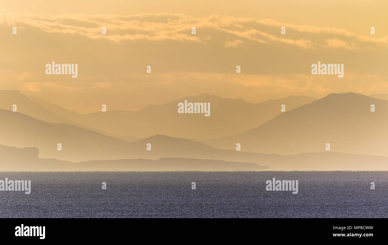 Silhouettes of hills over ocean view in bay on peloponnese peninsula in Greece Stock Photo
