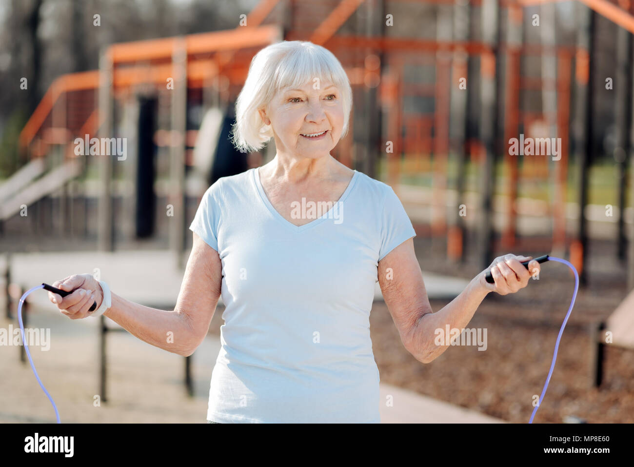 Senior woman jumping rope hi-res stock photography and images - Alamy