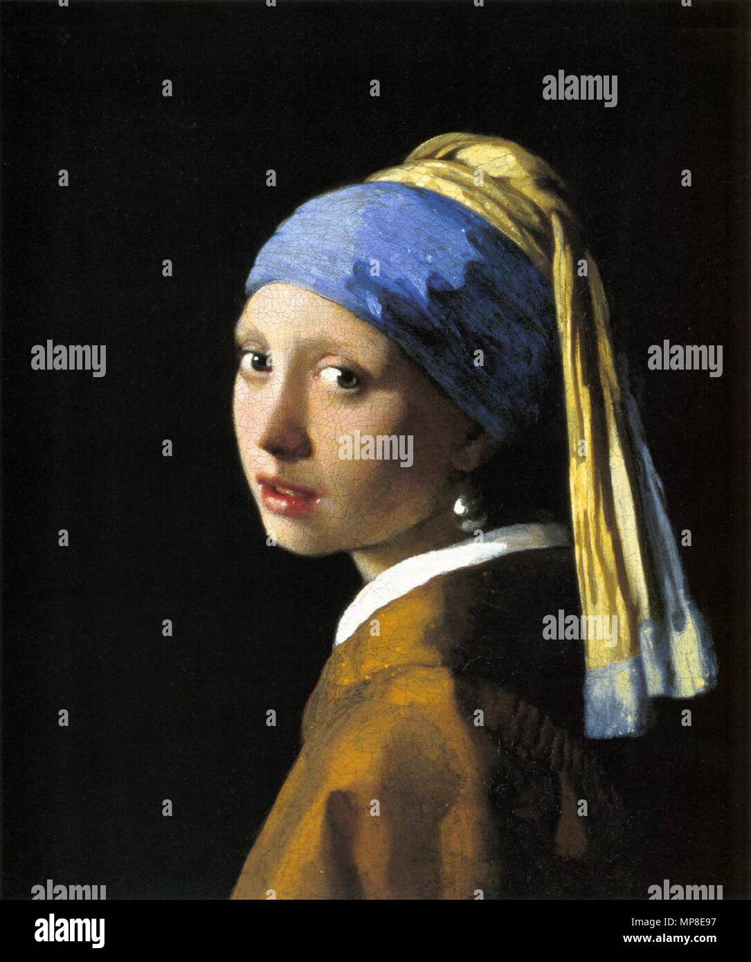 Girl with a Pearl Earring  circa 1665.   730 Johannes Vermeer - Girl with a Pearl Earring - WGA24666 Stock Photo