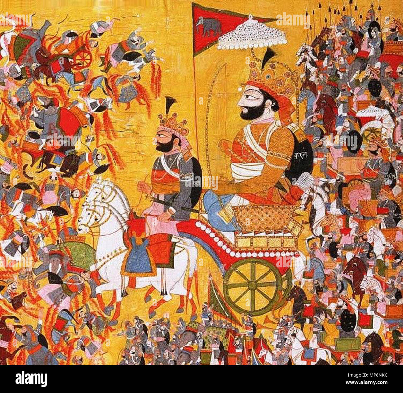 . English: The painting depicts the battle of Kurukshetra of the Mahabharata epic. Karna, commander of the Kaurava army is seen here. The painting is made in Himachal Pradesh or Jammu and Kashmir state of India and is opaque watercolor on cloth. 17 September 2011, 04:19 (UTC).  Arjuna and His Charioteer Krishna Confront Karna.jpg: Artist/maker unknown, India, Himachal Pradesh or Jammu and Kashmir derivative work: RajeshUnuppally 760 Karna in Kurukshetra Stock Photo