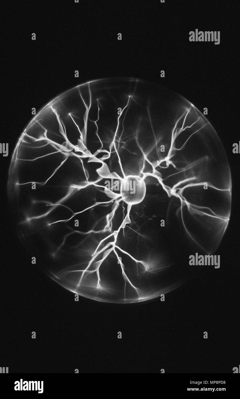 Glass ball with electrical currents shooting lightning like strikes