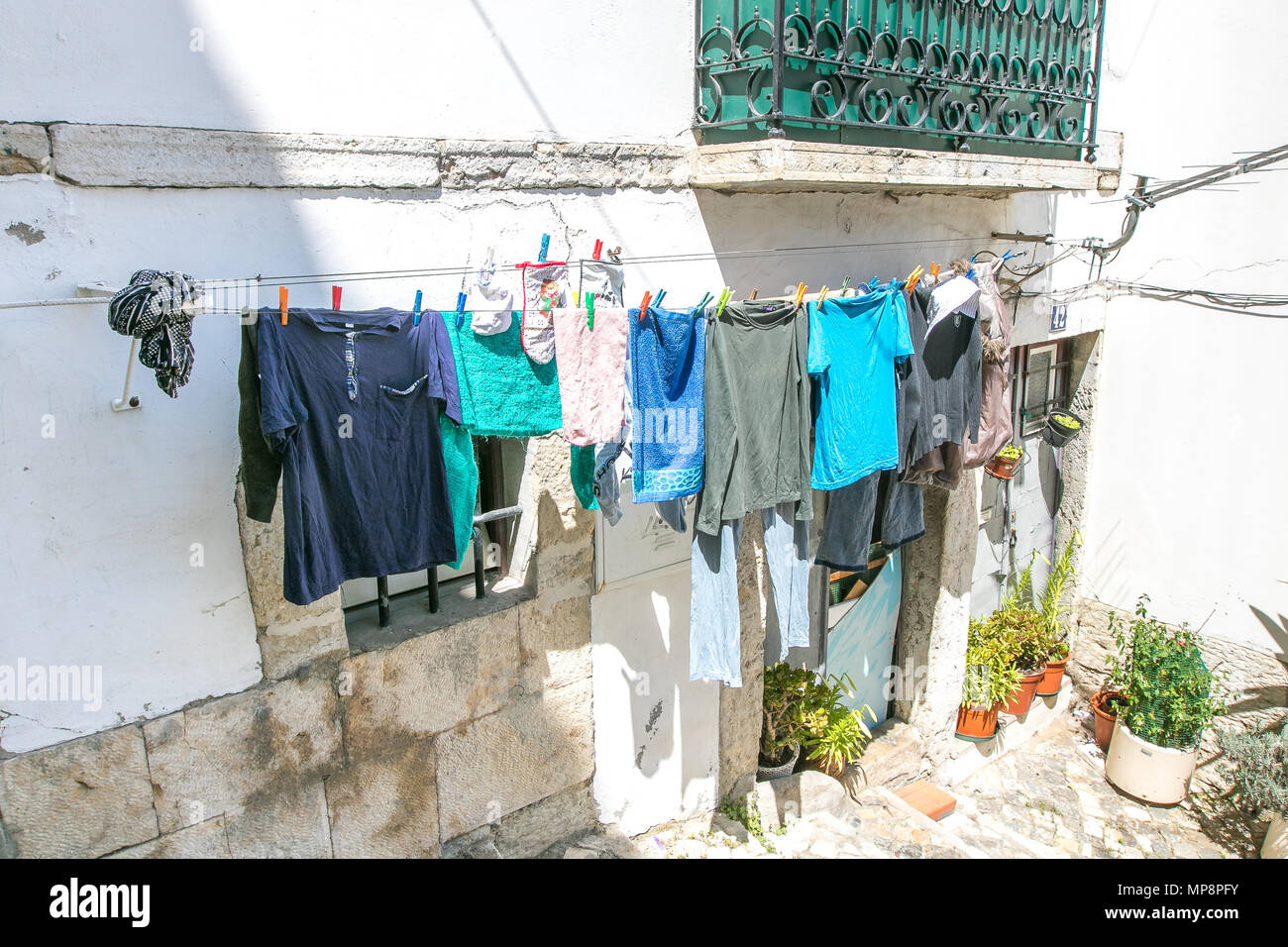 Clean laundry is hanging out to dry. Lisbon, Portugal Stock Photo Alamy
