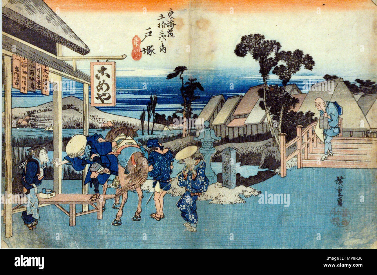 . English: Accession Number: 1957.226 Display Artist: Utagawa Hiroshige Display Title: Totsuka: Motomachi Detour Translation(s): Totsuka: Motomachi wakaremichi Series Title: 'The Fifty-three Stations of the Tokaido Road, known as the ''Hoeido Tokaido''' Suite Name: Tokaido gojusan tsugi no uchi Creation Date: ca. 1832-1833 Medium: Woodblock Height: 9 1/16 in. Width: 13 3/4 in. Display Dimensions: 9 1/16 in. x 13 3/4 in. (23.02 cm x 34.93 cm) Publisher: Tsuruya Kiemon and Takenouchi Magohachi Credit Line: Bequest of Mrs. Cora Timken Burnett Label Copy: 'Totsuka Station No. 6 (Series - 53 Statio Stock Photo