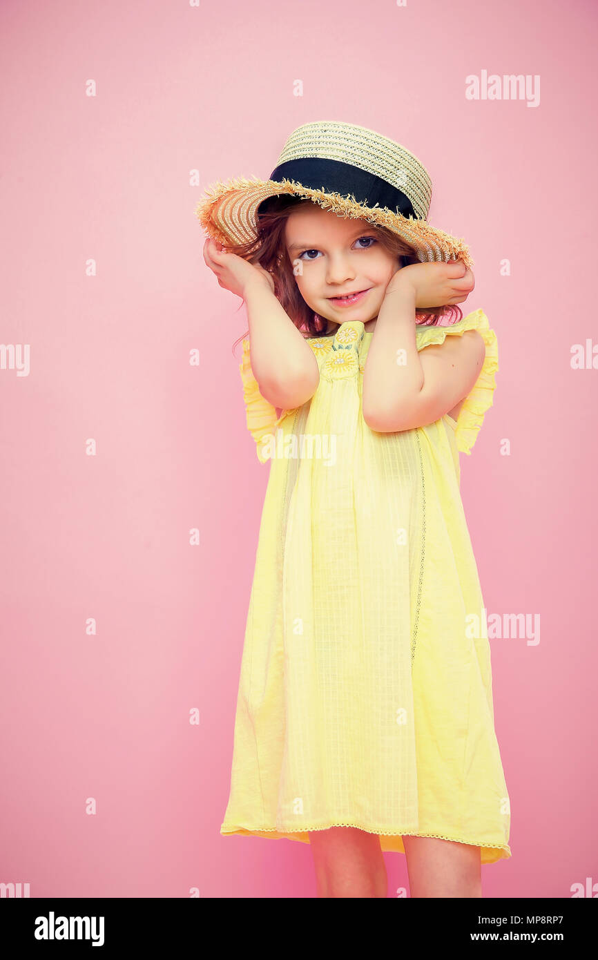 yellow dress and straw hat Stock Photo 