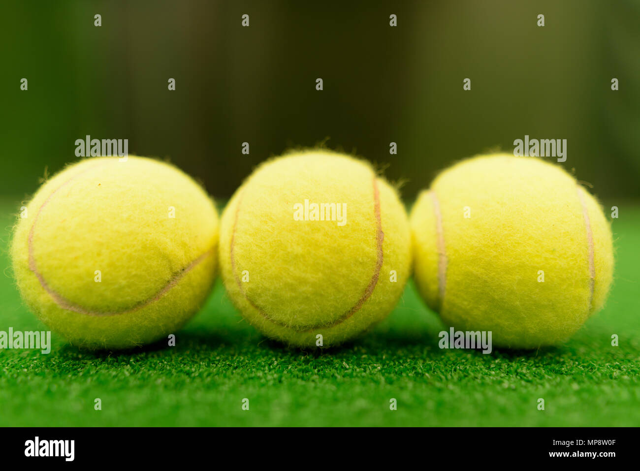 Tennis Balls On Green Surface Stock Photo Alamy
