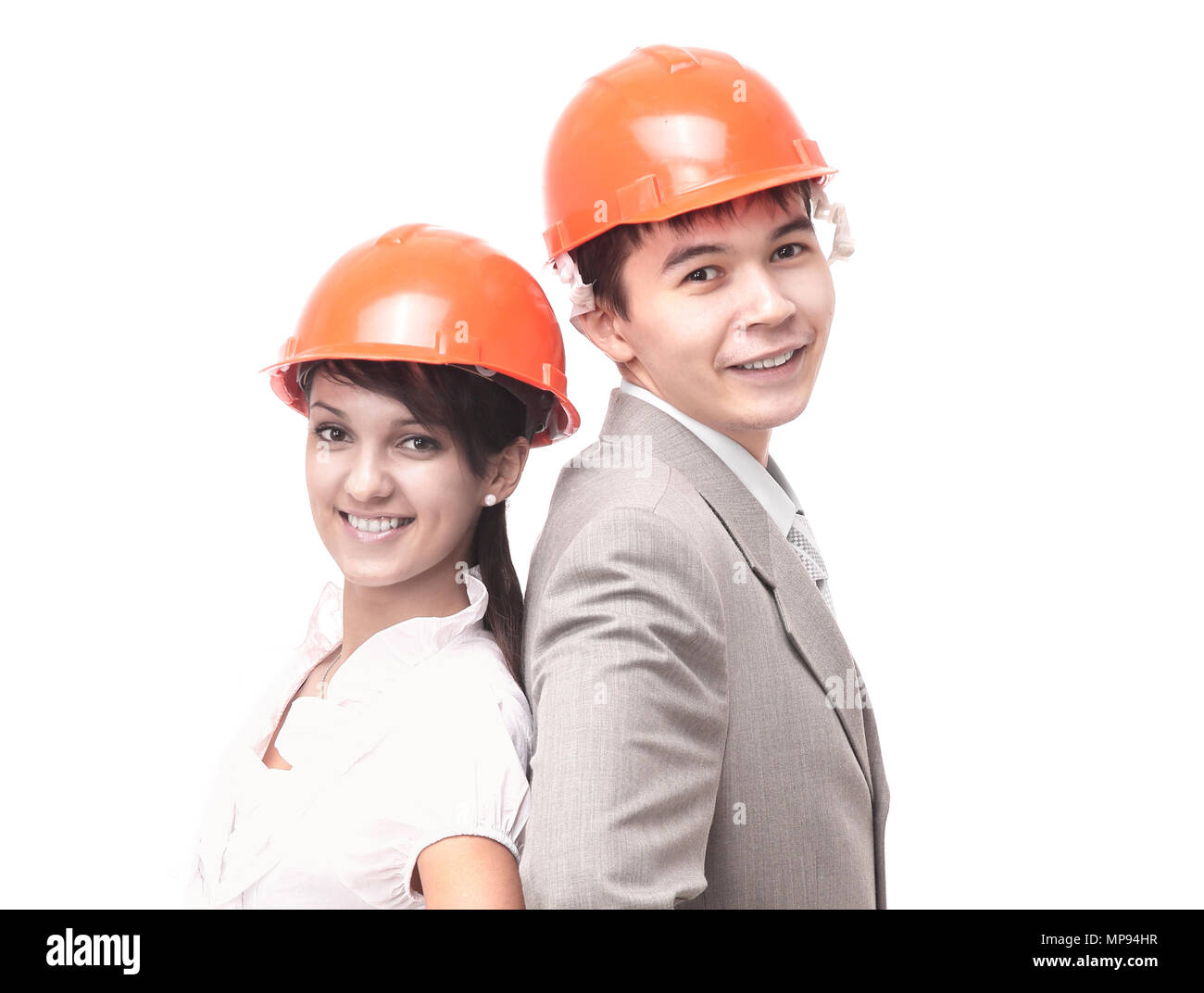 two successful young architect standing back to back Stock Photo