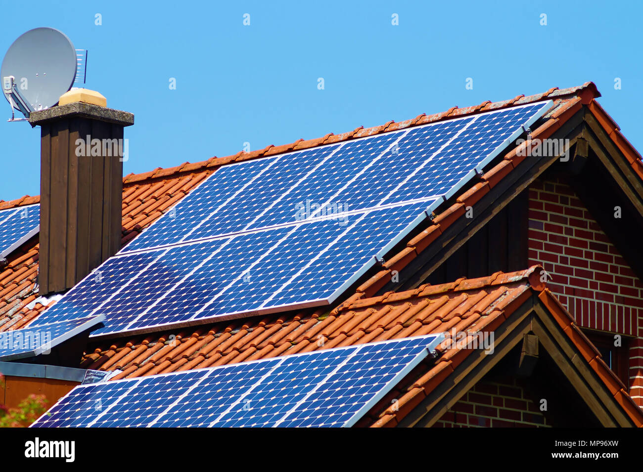 Solar Collectors on a roof Stock Photo