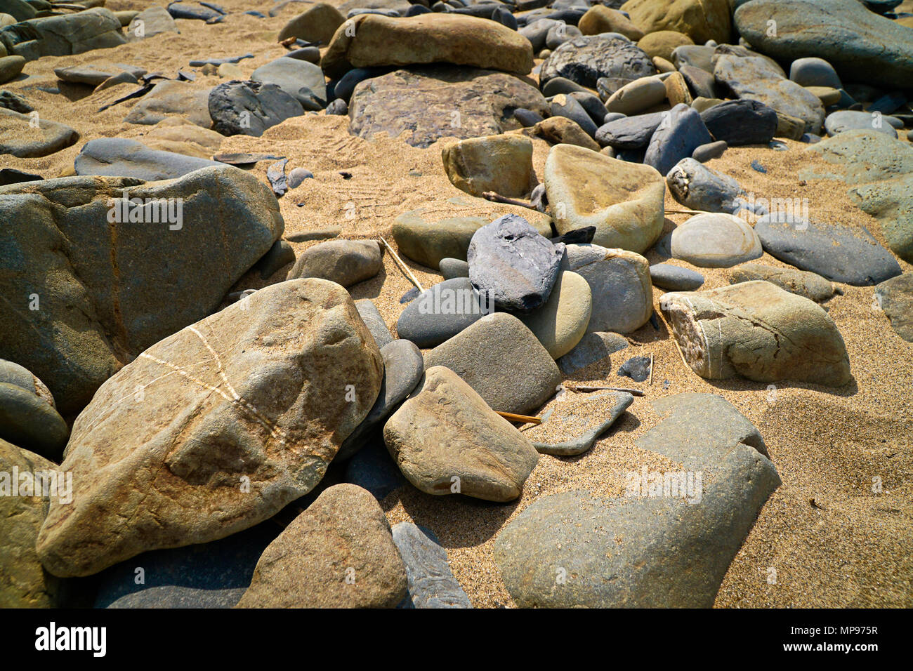 Beach - Pebbles In The Sand Stock Photo
