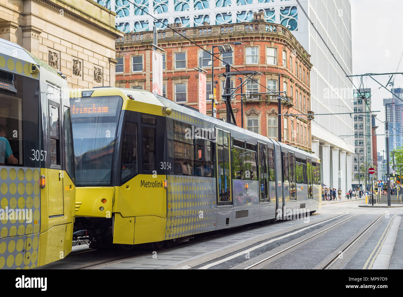 MANCHESTER, ENGLAND - 20 MAY, 2018: A tram on the Metrolink light rail system in the city centre of Manchester Stock Photo