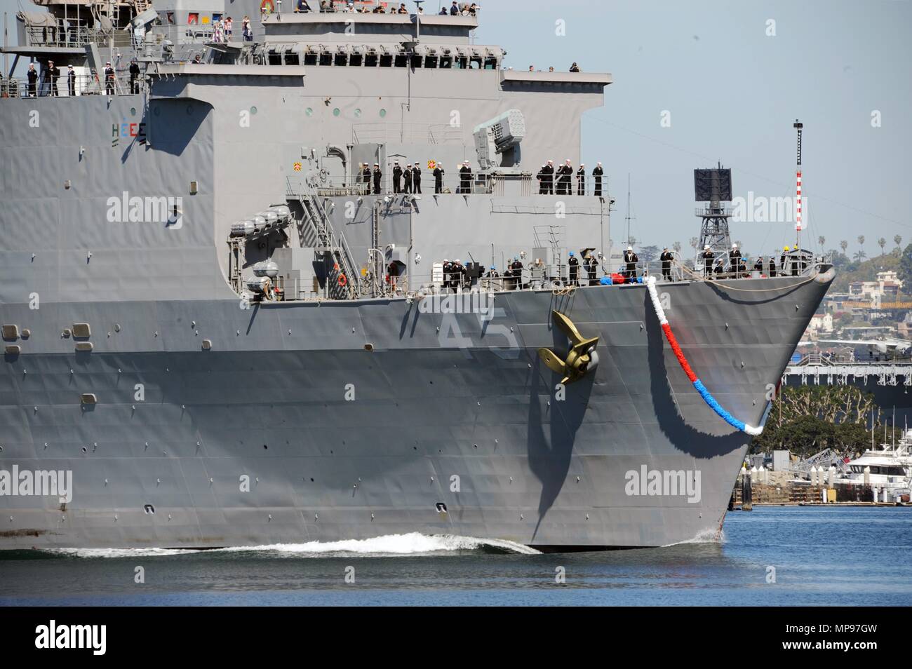 The U.S. Navy Whidbey Island-class amphibious dock landing ship USS Comstock arrives at the Naval Base San Diego February 25, 2015 in San Diego, California.   (photo by Rosalie Chang via Planetpix) Stock Photo