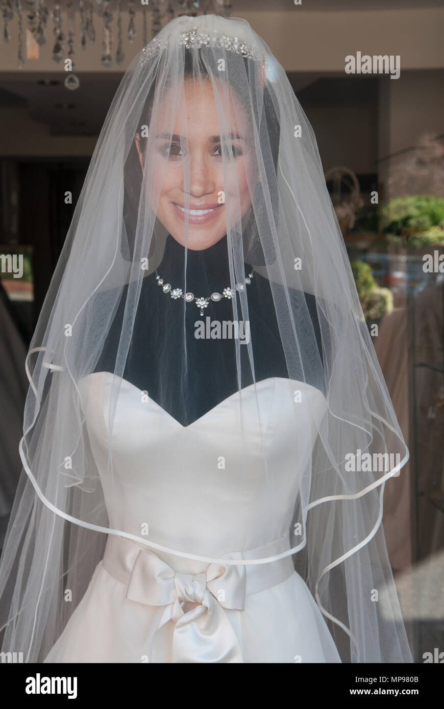 Wedding dress shop using cut out card face of Meghan Markle the Duchess of Sussex May 2018 Windsor England HOMER SYKES Stock Photo