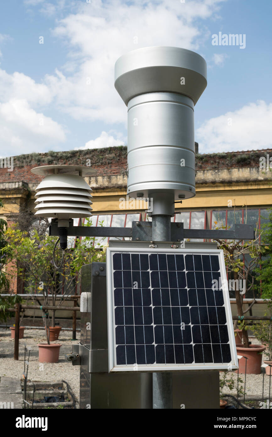 An automated hydrometeorological station powered by a solar panel, Lucca botanical garden, Italy, Europe Stock Photo