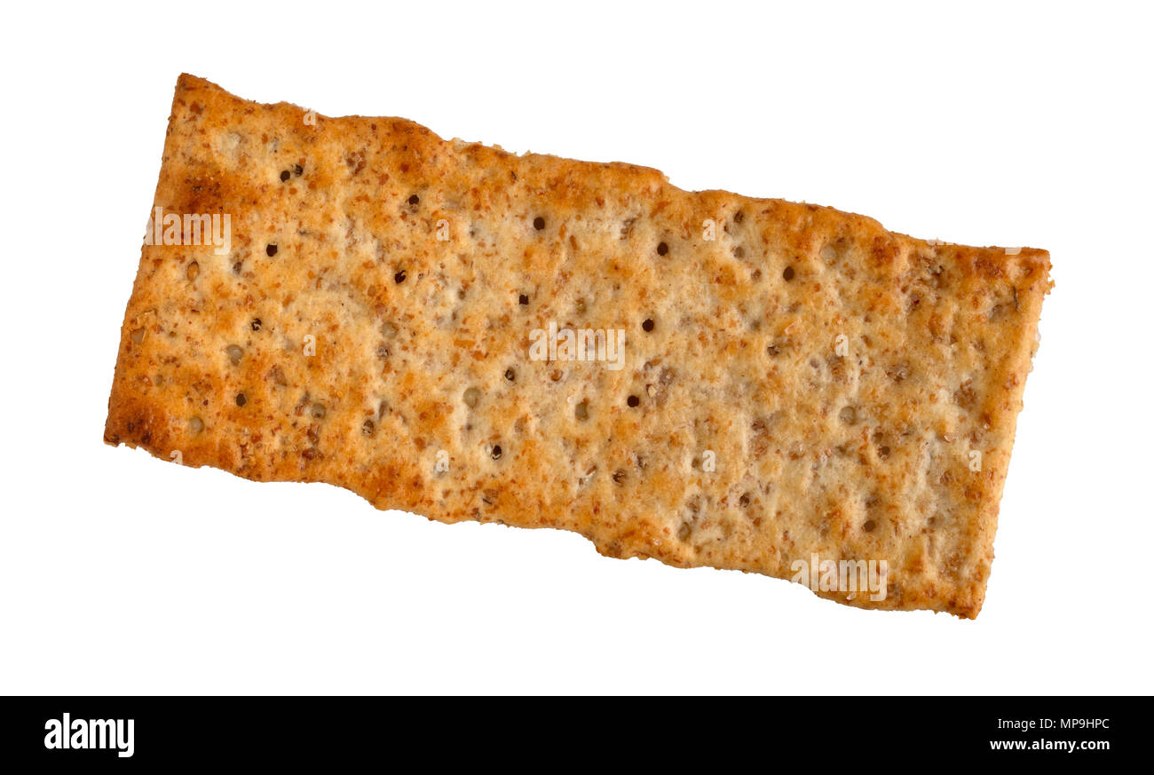 Top view of a single multigrain flatbread cracker isolated on a white