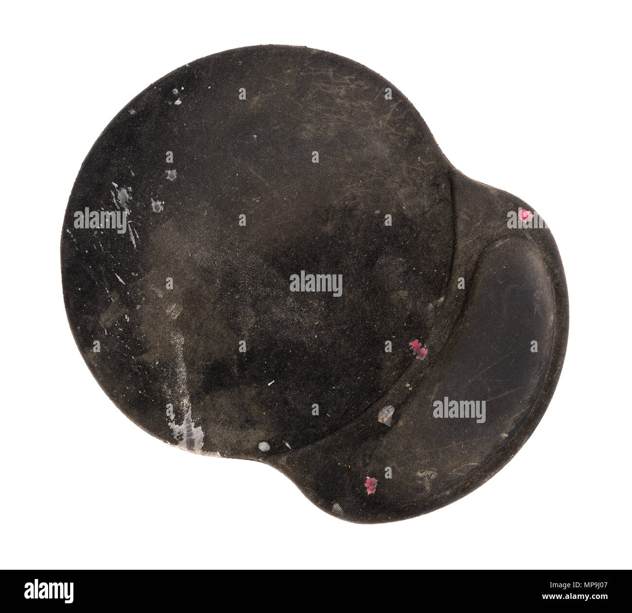 Top view of a very dirty black mouse pad isolated on a white background