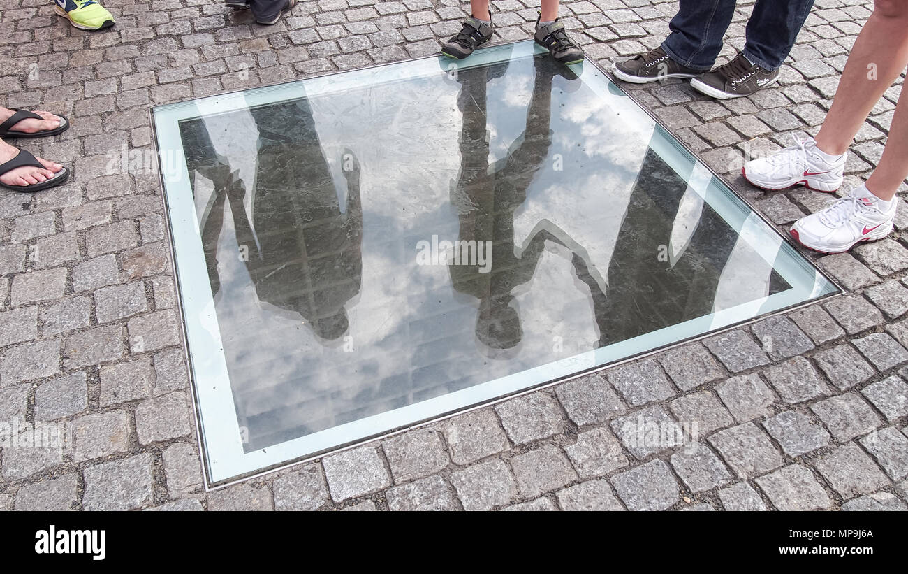 BERLIN, GERMANY-JULY 31, 2016: A memorial to the Nazi book burning by Micha Ullman set into the Bebelplatz. Stock Photo