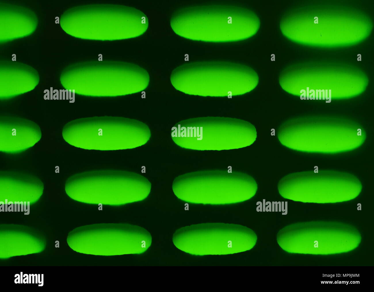 light through oval wall hole pass green canvas waterproof rain Stock