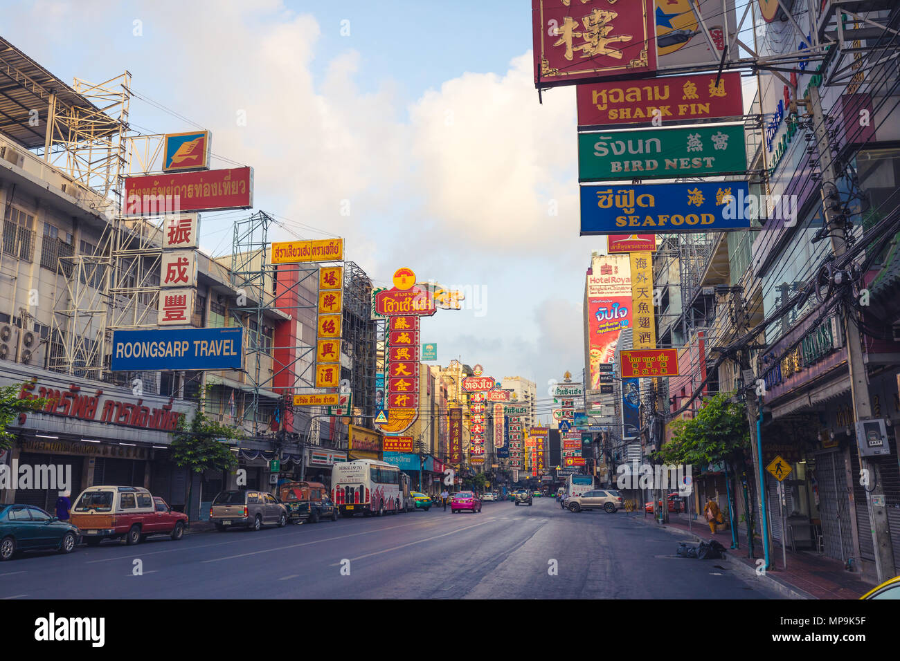 Chinatown , Bangkok , Thailand -March 26 , 2017: street with colored billboard in Yaowarat road , famous place of Chinatown in day Stock Photo