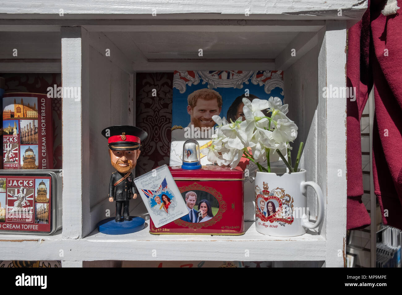 Prince Harry and Megham Markle souvenirs in a s shop window in Cambridge, UK. Stock Photo