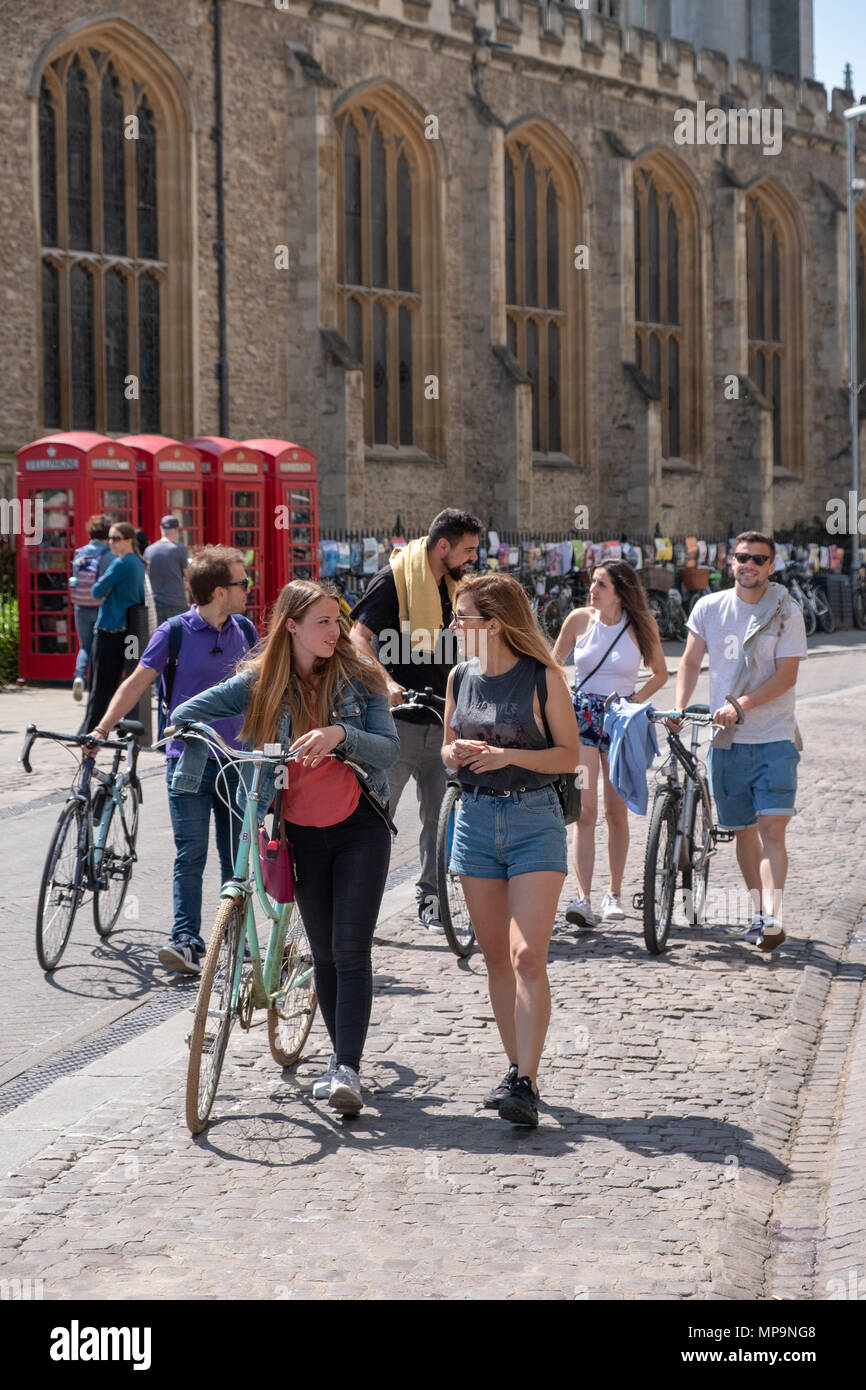 Group of good-looking young people walking in Cambridge city centre, UK. Stock Photo