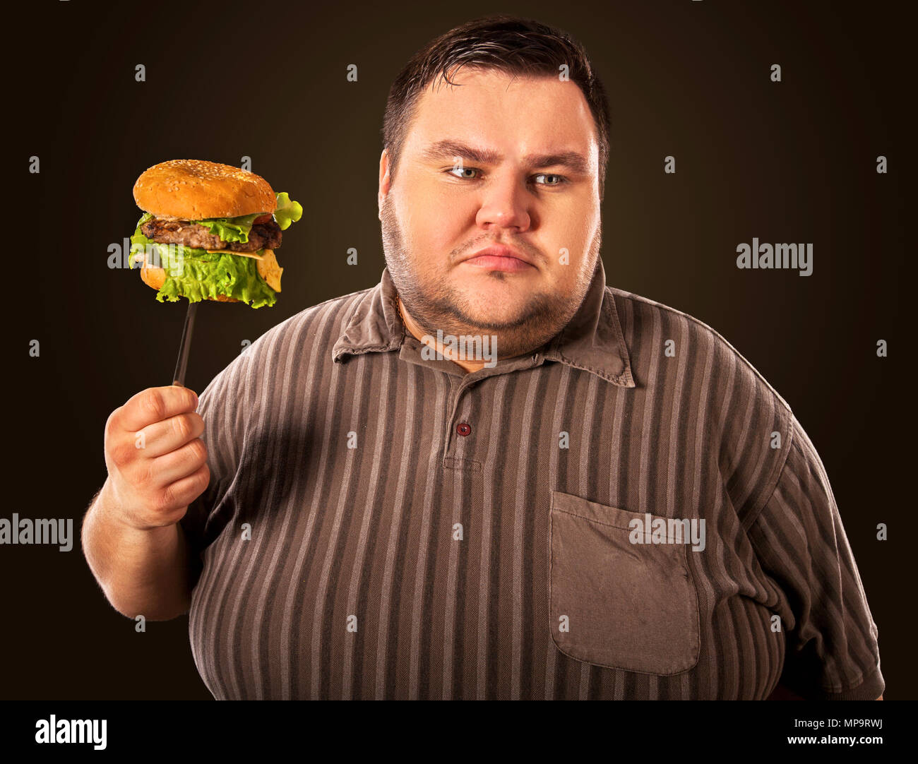 Fat Man Eating Fast Food Hamberger Breakfast For Overweight Person Stock Photo Alamy